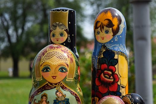 The matryoshkas are on the table. National Russian art painted matryoshkas.