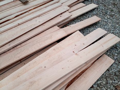Boards with a sawmill. Building material from wood, boards for construction.