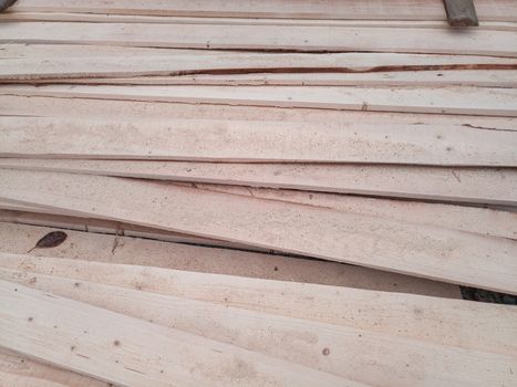 Boards with a sawmill. Building material from wood, boards for construction.