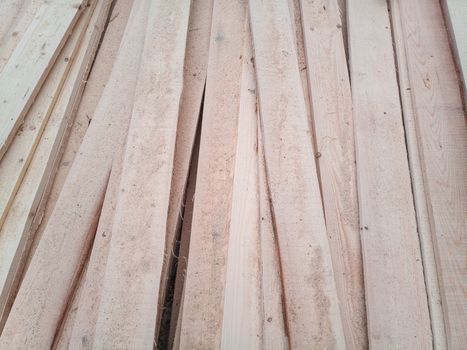 Boards with a sawmill. Building material from wood, boards for construction.