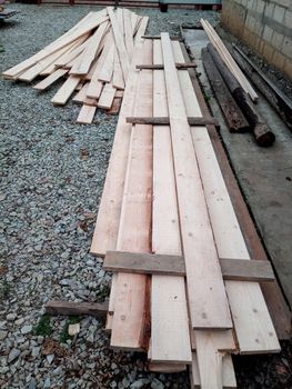 Boards with a sawmill. Building material from wood, boards for construction.