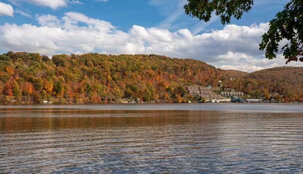 Panorama of the autumn fall colors surrounding Cheat Lake from the waterside near Morgantown, West Virginia