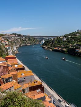 View over the roofs down to the Douro River from the train tracks on Ponte Luis in Oporto