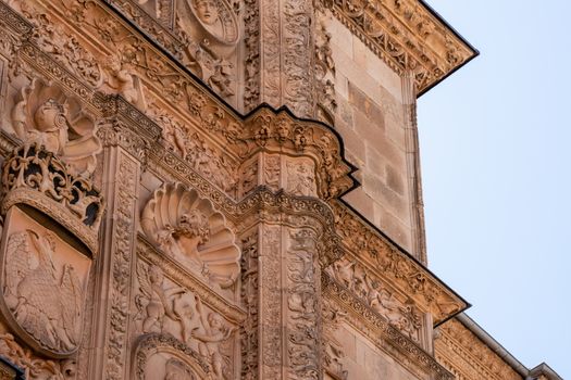 Detail of the ornate facade in the plateresque style at the University of Salamanca in Spain
