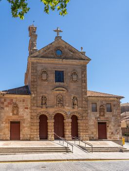 Detail of the bell tower and stork bird nest on the roof of San Pablo church in Salamanca Spain