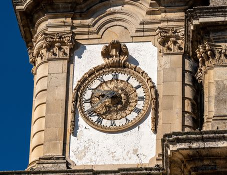 Antique clock on the Santuario de Nossa Senhora dos Remedios at the top of the baroque staircase above Lamego