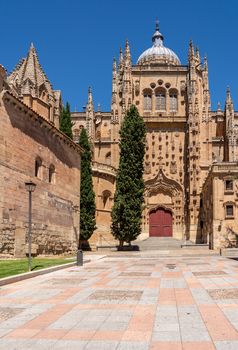 Exterior view of the side facade and dome of the New Cathedral in Salamanca