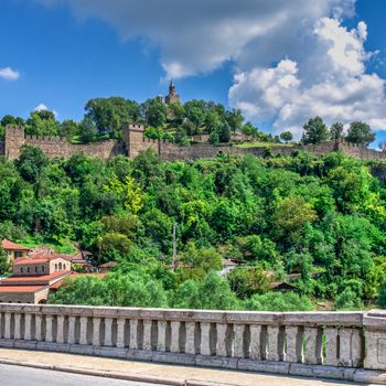 Tsarevets fortress with the Patriarchal Cathedral of the Holy Ascension of God in Veliko Tarnovo, Bulgaria. Big size panoramic view on a sunny summer day