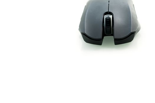 Wireless black computer mouse isolated on white background, closeup frontview