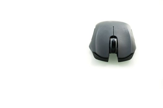 Wireless black computer mouse isolated on white background, frontview