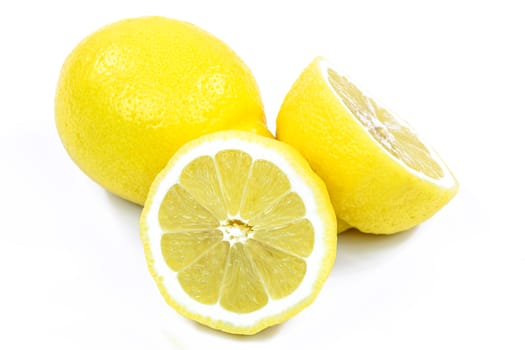 Two fresh lemons isolated on white background.