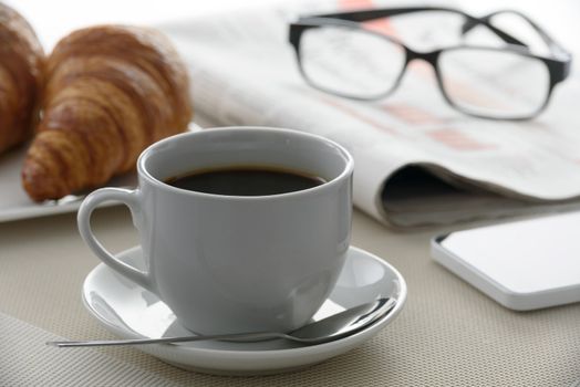 Coffee and french croissants for breakfast at the hotel during the morning press.