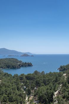 Meditation and fun in nature. Forest and beautiful sea in Mediterranean.