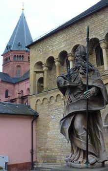 The cathedral of Mainz with statue the of a bishop