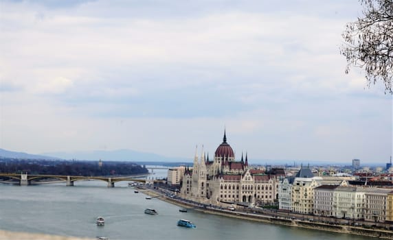 Hungarian Parliament Building and Danube with boats and Margaret Island