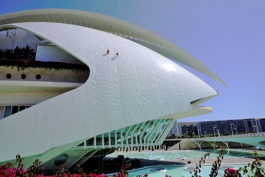 Workers on the roof of Palau de les Arts Reina Sofia City of Arts and Sciences, Valencia Spain