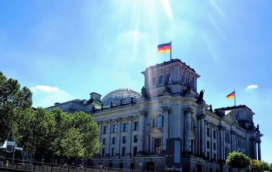 The sun shining on the Reichstags building in Berlin, Germany