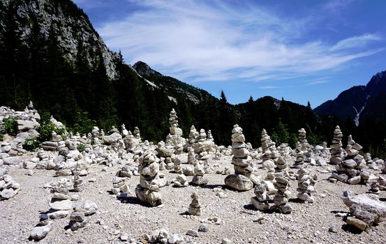 Viewpoint with stone piles, Vrsic pass and Triglav Mountains, Slovenia
