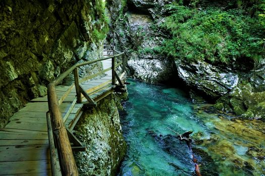 Vintgar Gorge wooden path and beautiful Radovna river near Podhom, Slovenia