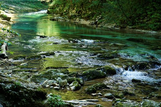 Pure and fresh Radovna river in Podhom, Slovenia