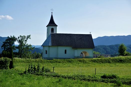 Holy Trinity Church and meadow in Zasip, Slovenia