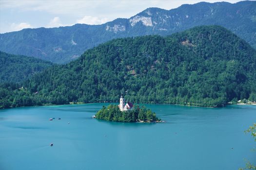 Traditional Pletna boats around Bled island on lake Bled, Slovenia