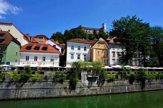 View over Ljubljanica river to the castle of Ljubljana, Slovenia