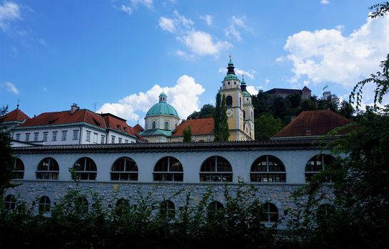 Ljubljanica river, Saint Nicholas Church and castle in Ljubljana, Slovenia