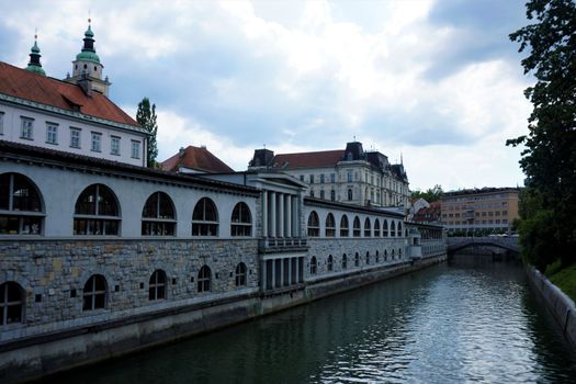 Ljubljanica river and Saint Nicholas Church in Ljubljana, Slovenia