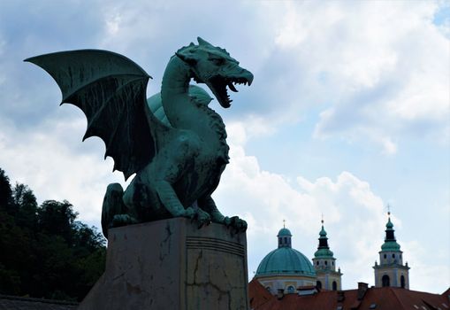 Dragon from the dragon bridge and Saint Nicholas cathedaral Ljubljana, Slovenia