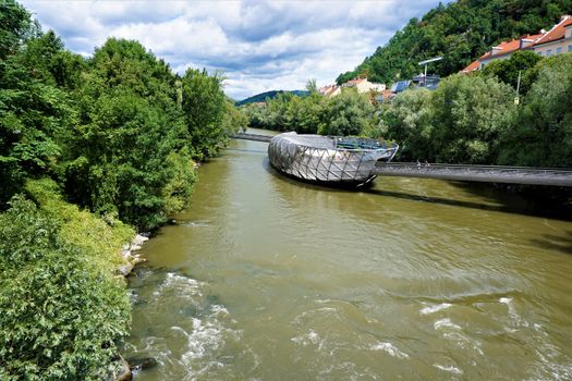 Mur river and island in Graz, Austria