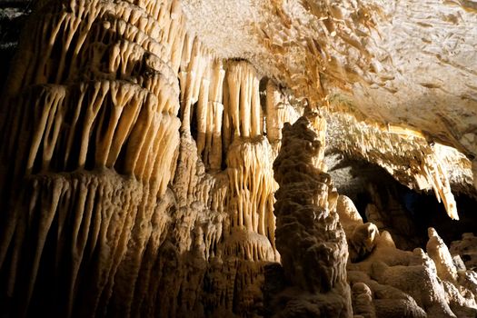 Different kinds of stalactites and stalagmites in the Postojna cave, Slovenia