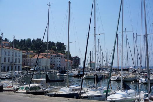 Boats and houses at the port of Piran, Slovenia