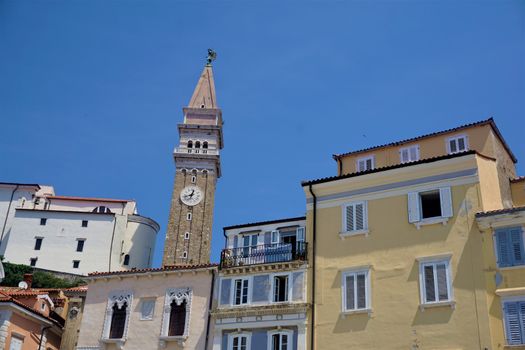Pastel coloured houses and bell tower of Piran, Slovenia