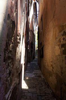 Narrow street in the city center of Piran, Slovenia