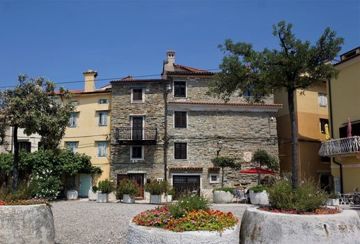 Houses and flowers at the promenade of Piran, Slovenia