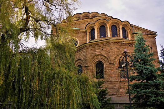 Sweta Nedelja cathedral with trees in Sofia, Bulgaria