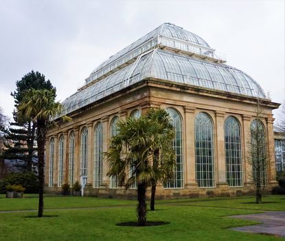 Facade of one of the glass houses in the Royal Botanical Garden of Edinburgh, Scotland