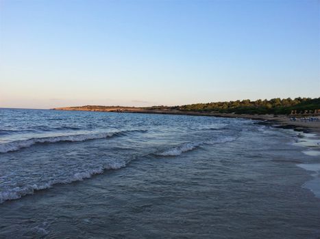 Sunset over the beach of Cala Millor in Mallorca, Spain