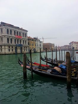 Typical Gondola boats at the pier in Venice, Italy