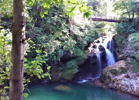 Idyllic view to Sum waterfall in the Vintgar Gorge, Triglav National Park near Bled, Slovenia