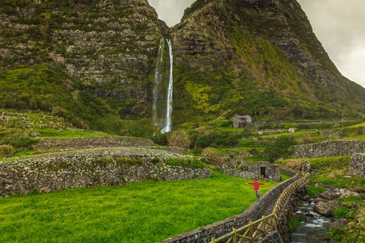 Young traveler woman walking alone in the paradise - Azores, Portugal