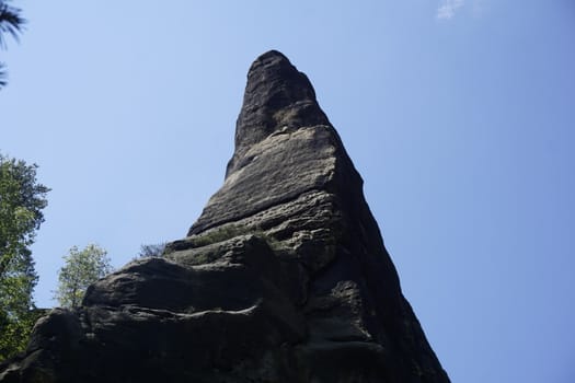 High and spiky sandstone rock spotted in Saxon Switzerland, Germany