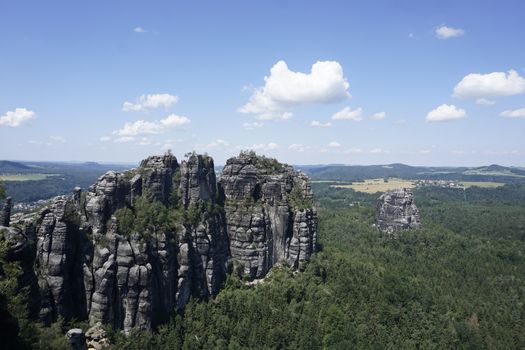View from Schrammstein viewpoint to High and Middle Torstein and the Falkenstein in Saxon Switzerland, Germany