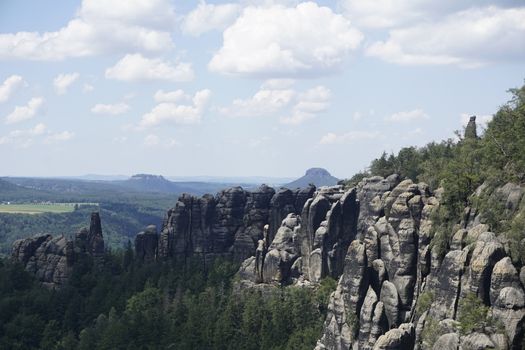 Close-up of the Schrammsteine with Lilienstein and Konigstein view in Saxon Switzerland