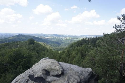 View from the Carolafelsen over landscape in Saxon Switzerland, Germany with huge rock