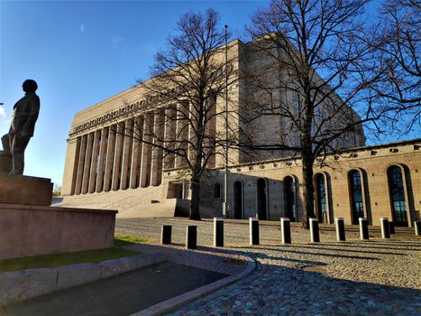 Finnish Parliament House with statue of K. J. Stahlberg in Helsinki, Finland