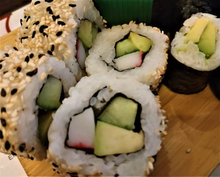Different kinds of Maki Sushi with seaweed an sesame