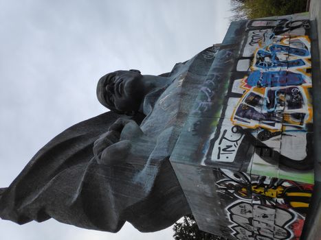 Monument with graffito in a park in Berlin, Germany