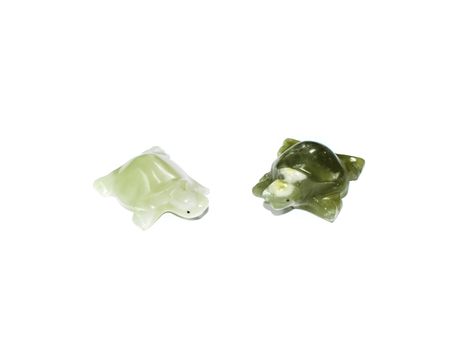 Turtles from green onyx. Stone carving.
